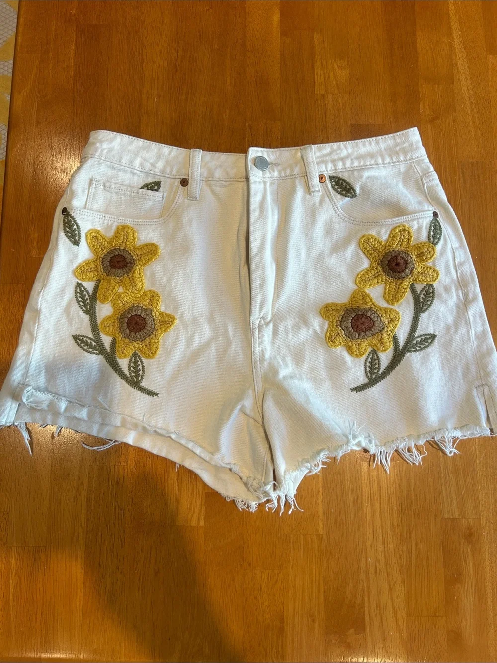 Blank NYC White Denim Shorts with Yellow Sunflower Crochet